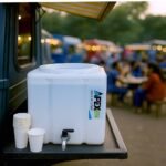 Outdoor kitchen in an Indian café with Apex 50L loft tank providing clean water.